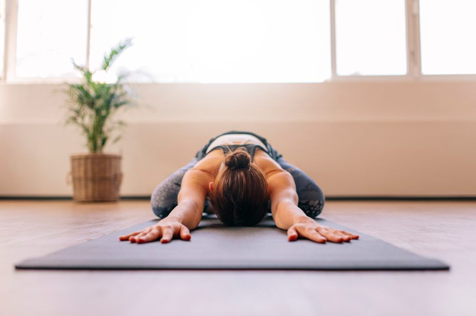 4 Tips To Relieve Back Pain, According To An Expert