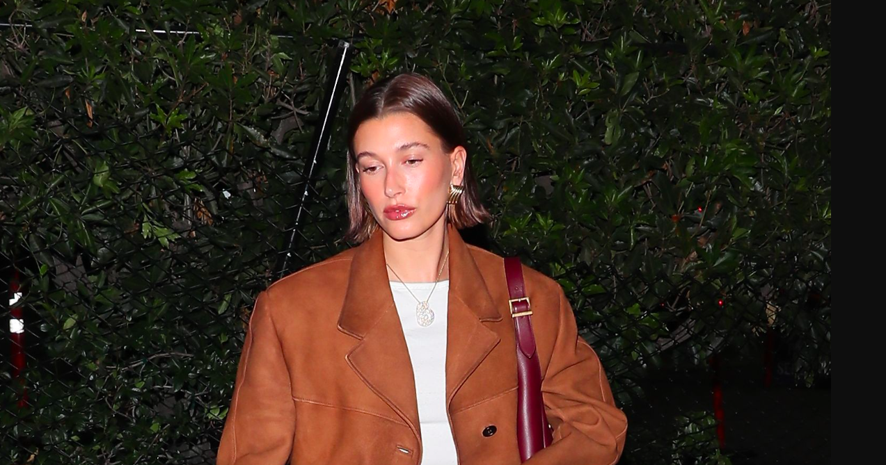 Hailey Bieber Wears An Oversized Jacket And Micro-Miniskirt